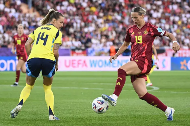 Sweden's defender #14 Nathalie Bjorn (L) and Germany's midfielder #19 Klara Buehl fight for the ball the UEFA Women's Euro 2025 Group C football match between Sweden and Germany at Letzigrund Stadium in Zurich, on July 12, 2025.