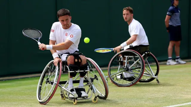 Gordon Reid and Alfie Hewett in action