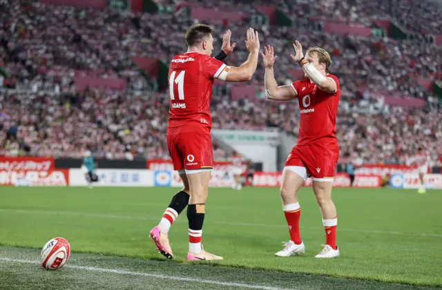 Wales' Josh Adams (left) celebrates with Blair Murray