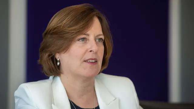 Headshot of Melanie Dawes speaking