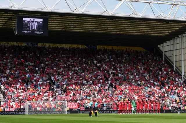 Liverpool players and fans stand for a minutes silence in memory of Liverpool player Diogo Jota ahead of the pre-season friendly match at Deepdale Stadium, Preston. Liverpool remain in mourning following the death of Portugal forward Jota, 28, and his brother Andre Silva, 25, in a car crash in Zamora, Spain, on July 3