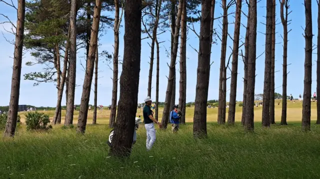 Golfer in the trees