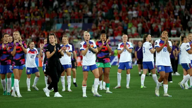 The players of England applaud the fans following the team's victory