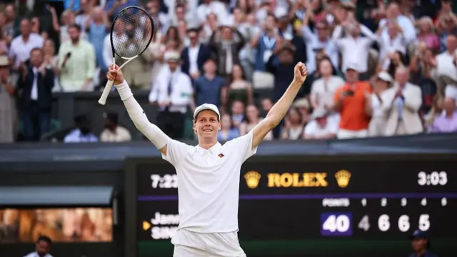 Jannik Sinner celebrates winning the Wimbledon title
