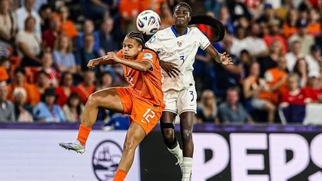 Chasity Grant of the Netherlands, Thiniba Samoura of France battle for the ball