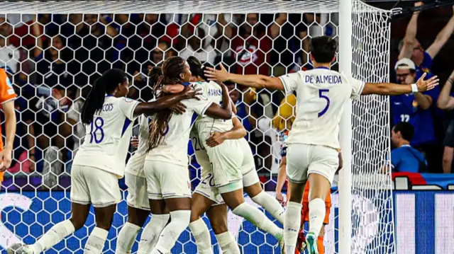 players of France celebrate the fourth goal