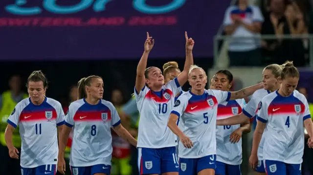 Ella Toone of England celebrating her goal with her teammates