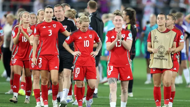 Wales look dejected at full-time following the team's defeat and subsequent elimination in the UEFA Women's EURO 2025 Group D match between England and Wales at Arena St. Gallen