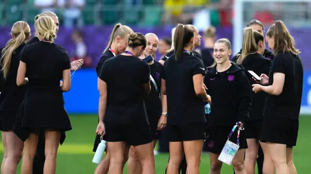 England's Jessica Park (fourth right, facing) and team-mates as they inspect the pitch