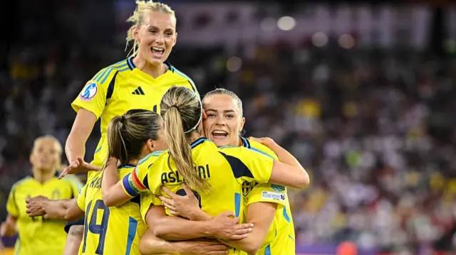 Fridolina Rolfoe of Sweden celebrates after scoring her team's third goal with teammates
