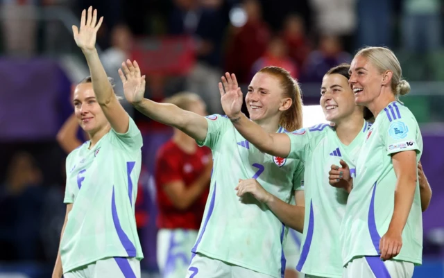 Wales' Josie Green, Ceri Holland, Angharad James-Turner and Sophie Ingle wave to fans after the match