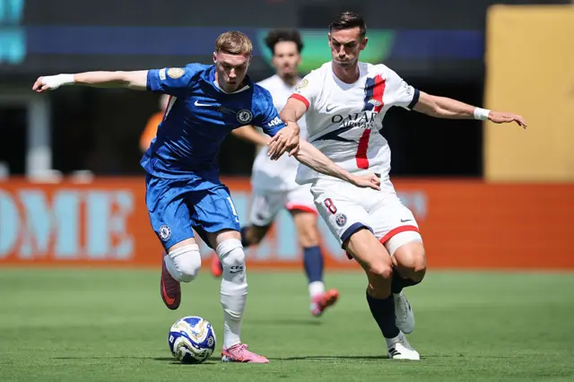 Cole Palmer in action with Fabian Ruiz