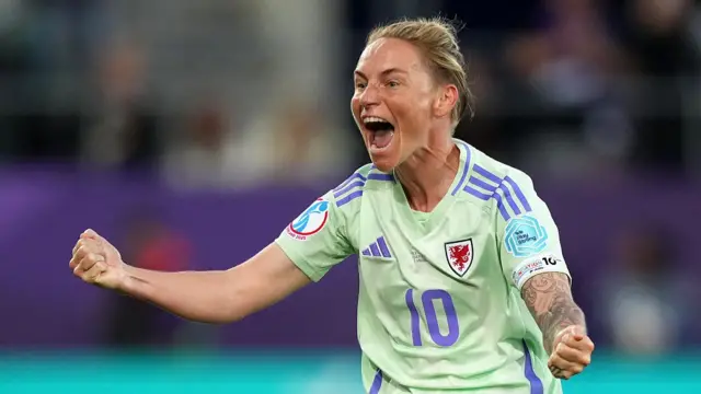 Jess Fishlock of Wales celebrates scoring her team's first goal