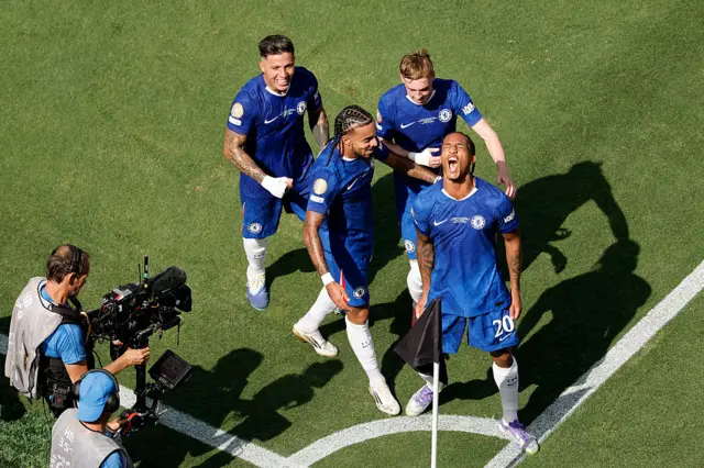 Chelsea players celebrate after going 3-0 up