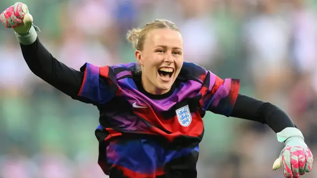 Hannah Hampton of England reacts as she warms up