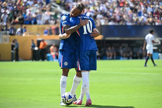 Joao Pedro hugs Cole Palmer