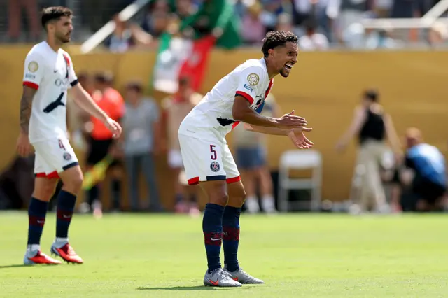 Marquinhos tries to gee up his teammates