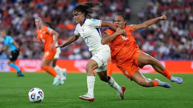 Chasity Grant of the Netherlands clashes with Sakina Karchaoui of France during the UEFA Women's EURO 2025 Group D match between Netherlands and France at St. Jakob-Park