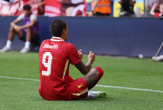 Darwin Nunez celebrates a goal by mimicking playing a console game