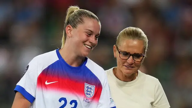 Alessia Russo of England interacts with Sarina Wiegman, Head Coach of England