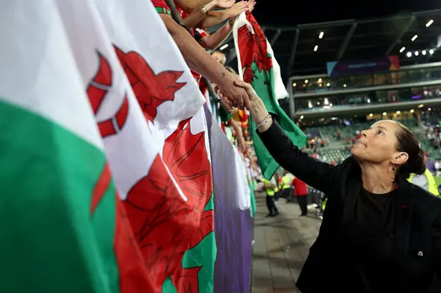 Rhian Wilkinson, Head Coach of Wales, interacts with the fans