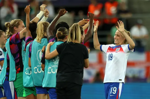 Aggie Beever-Jones of England celebrates with teammates
