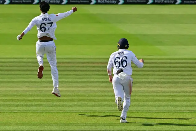 Shoaib Bashir celebrates a wicket v India