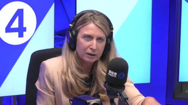 Deborah Turness wearing headphones and speaking into a mic in the BBC R4 studio