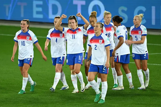 Lauren Hemp celebrates with teammates