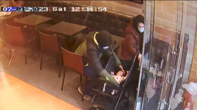 CCTV image of Mark Gordon and Constance Marten with a baby in a pushchair