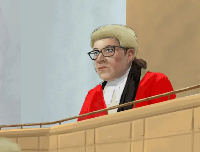 A painted digital sketch of Mrs Justice Lambert presiding over her court room. She has glasses and a cream wig and is wearing black and red robes.
