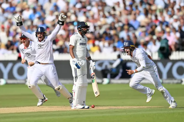 England celebrate the wicket of Mohammed Siraj