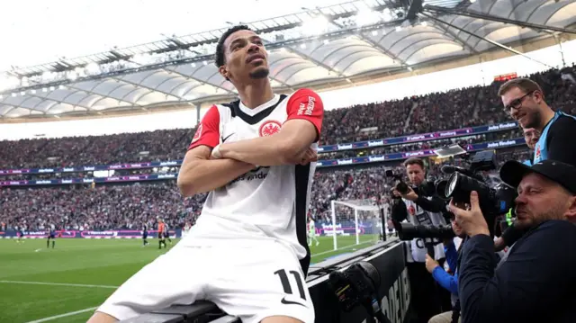 Hugo Ekitike celebrates scoring for Frankfurt