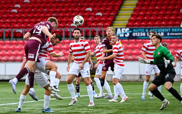 ...and rises at the back post for Hearts to score against Hamilton tonight