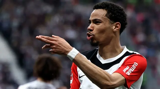 Hugo Ekitike celebrates scoring a goal for Eintracht Frankfurt