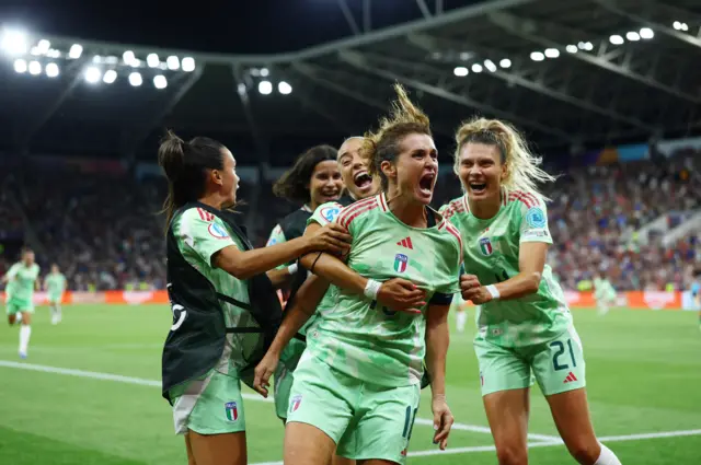 Italy's Cristiana Girelli celebrates scoring their second goal with teammates