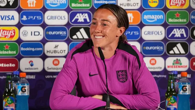 Bronze speaking to the media
