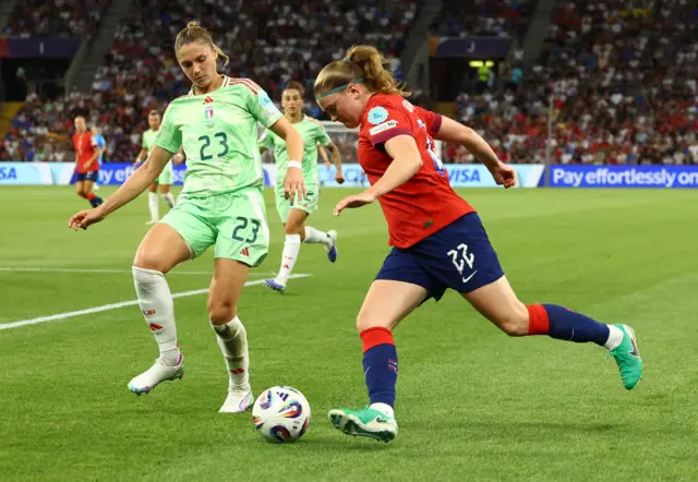 Norway's Signe Gaupset in action with Italy's Cecilia Salvai