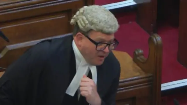 Tom Little, KC in barrister's gown and white wig at the appeal court. He is leaning forward slightly while speaking.