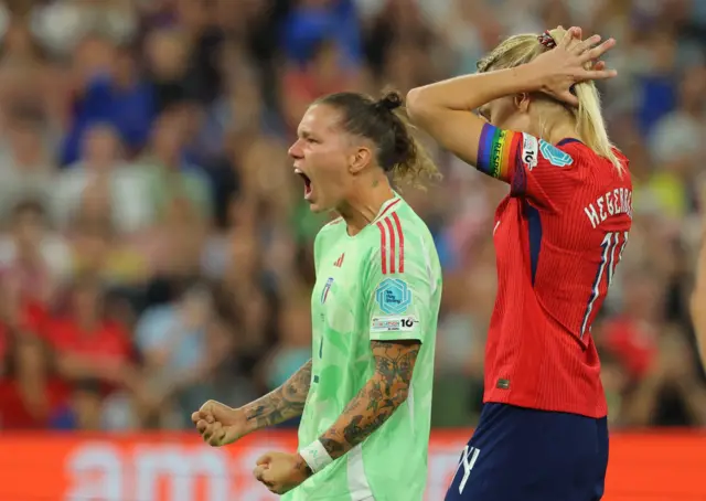 Norway's Ada Hegerberg reacts after missing from the penalty spot as Italy's Elena Linari celebrate