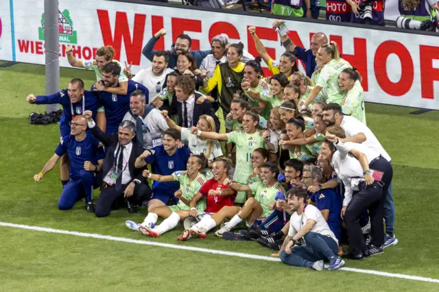 Players and staff of Italy celebrate winning the UEFA Women's EURO 2025 quarter final soccer match between Norway and Italy in Geneva, Switzerland, 16 July 2025.