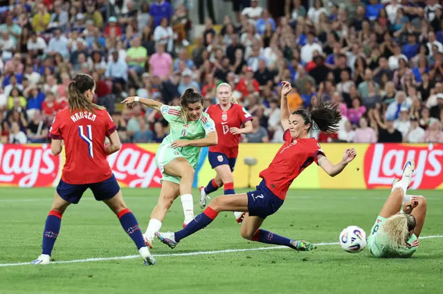 Sofia Cantore of Italy scores a goal under pressure from Ingrid Syrstad Engen of Norway which was later ruled out during the UEFA Women's EURO 2025 Quarter-Final match between Norway and Italy at Stade de Geneve on July 16, 2025 in Geneva, Switzerland.