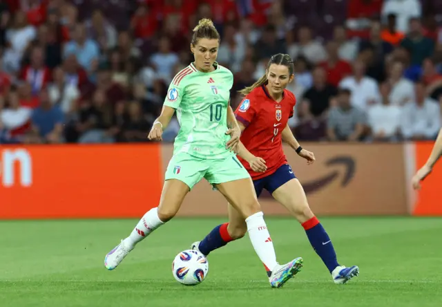 Italy's Cristiana Girelli in action with Norway's Tuva Hansen