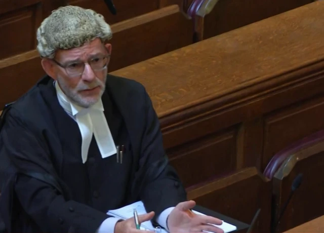 David Bentley KC at the Court of Appeal wearing a barrister's wig and black suit.