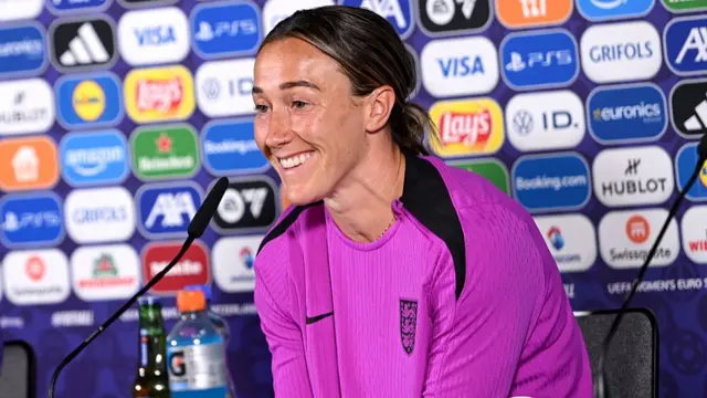 Bronze speaking to the media