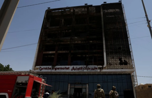 A photo taking in the morning of the heavily-damaged shopping centre