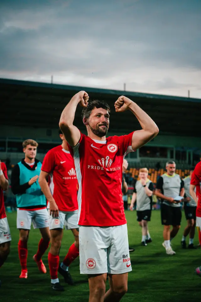 Tomas Cosgrove celebrates