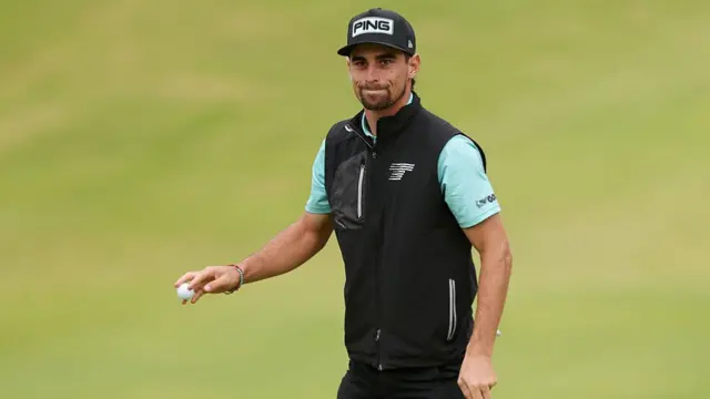Joaquin Nieman with his ball after a hole at The Open 2025