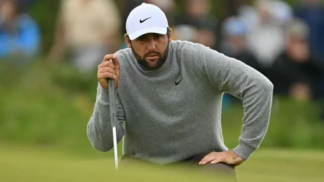Scottie Scheffler lines up a putt at Royal Portrush at the 153rd Open Championship