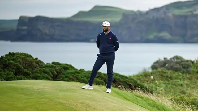 Jon Rahm looks over the green at the sixth green during the 153rd Open Championship at Royal Portrush